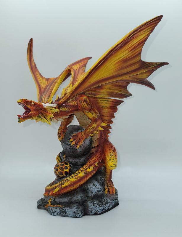 Dragon, Fire Orange/Yellow  on Rock 10" Tall